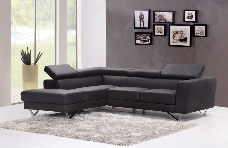 Incline module — corner sectional on a walnut frame, graphite leather